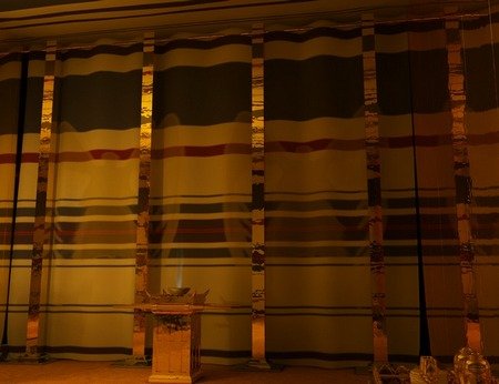 The Veil hanging on its pillars at the end of the Holy Place, with the Golden Altar standing before it