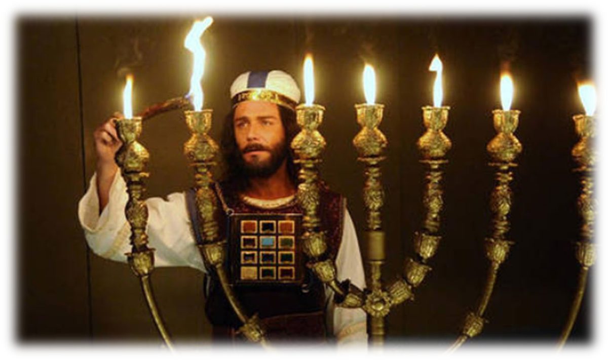 A priest in the breastplate and ephod tending the lit lamps of a golden lampstand in a dark chamber, reaching up to one of the flames with a tool