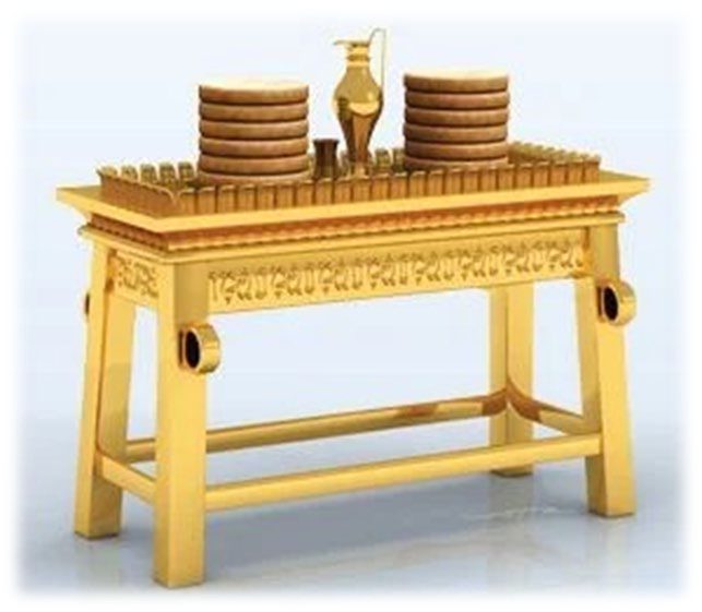 The Table of Shewbread in gold, with two stacks of loaves and golden vessels on its top, a crowned border around its edge and rings at its corners