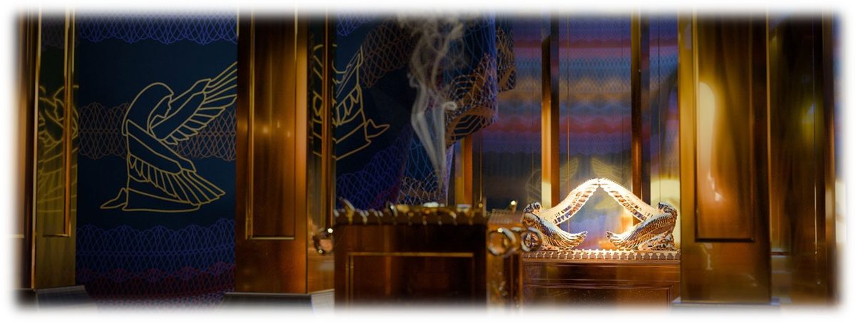 The veil embroidered with cherubim drawn aside between gold-covered pillars, the Golden Altar smoking before it, and beyond it the Ark of the Covenant with the two cherubim of the Mercy Seat